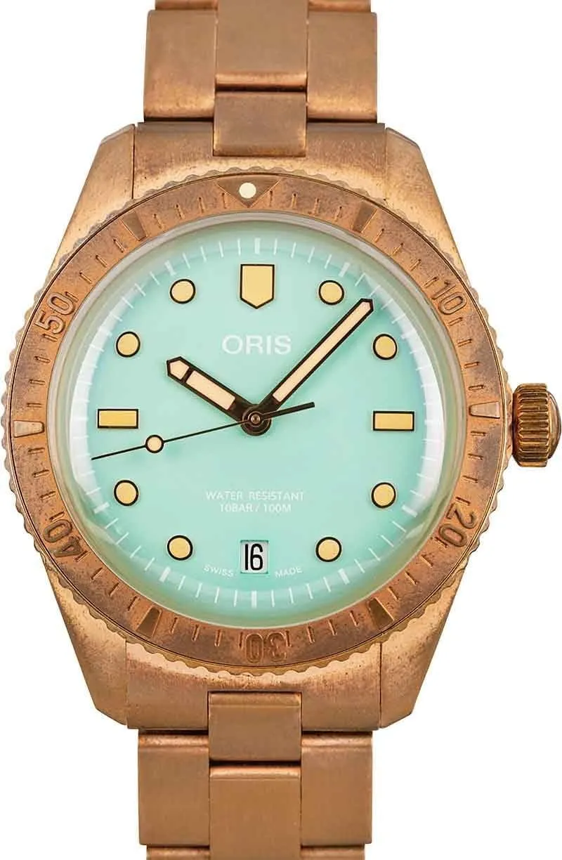 Bronze Cotton Candy Green leaning stature left - Model Number: 733 7771 3157 Oris Divers Sixty-Five 