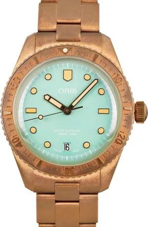 Bronze Cotton Candy Green leaning stature left - Model Number: 733 7771 3157 Oris Divers Sixty-Five 